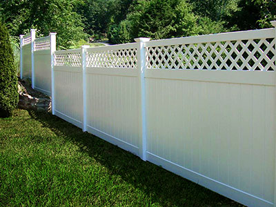 white vinyl fence