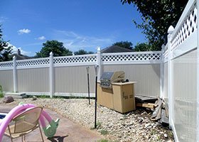 white fence with lattice