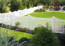 white vinyl picket fence
