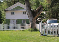 Olympia Arched White Vinyl Picket Fence