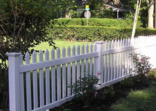 white vinyl picket fence