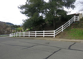 white vinyl farm fence
