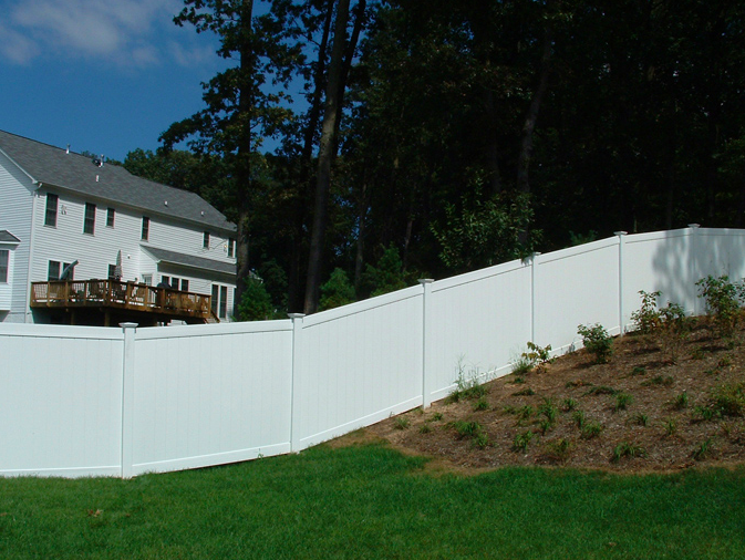 How to Build a Fence on a Slope: 2 Easy DIY Installation Methods