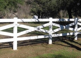 white crossbuck fence