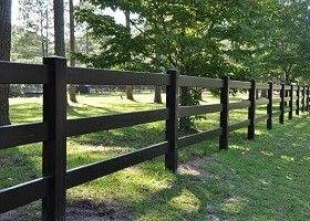 black post and rail horse fence