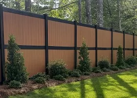 mocha walnut wood grain vinyl fence